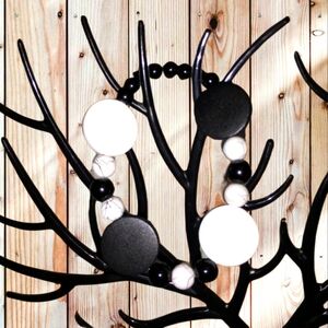 Black and white wood and glass bead bracelets